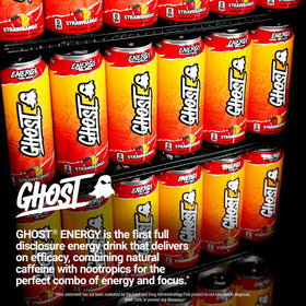 Ghost Energy Strawbango can beside glass, crisp color suggests refreshing flavor