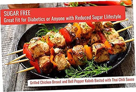 G Hughes Thai Chili Wing Sauce glaze on grilled meats for a zesty finish