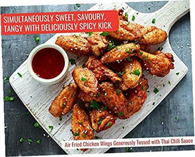 G Hughes Thai Chili Wing Sauce used as a marinade for grilled dishes