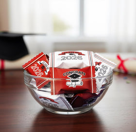 Gift Boutique red mints on a candy tray brighten graduation tables.