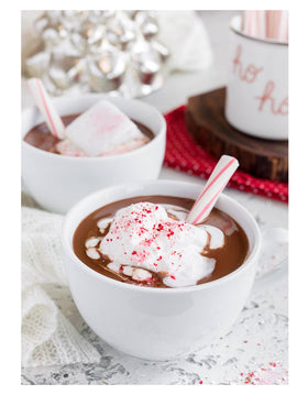 Gilliam Peppermint Sticks used as hot cocoa stirrers for cozy moments.