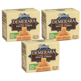 Gilway Demerara sugar cubes sweetening tea with golden color.