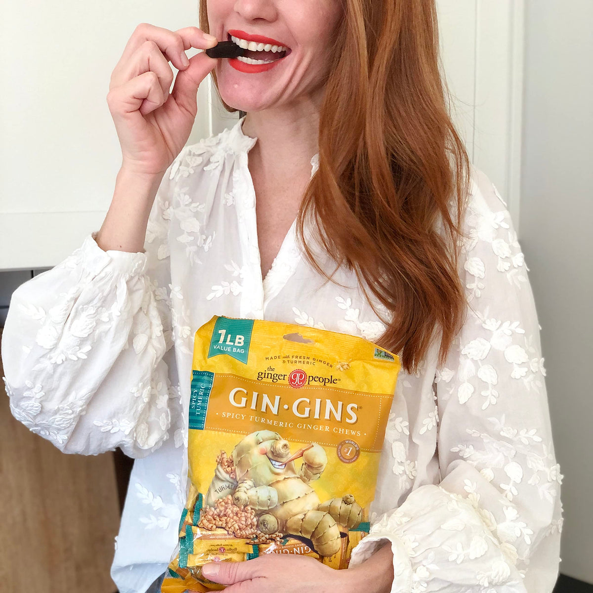 Gin Gins close-up shows chewy texture and bold turmeric-ginger flavor for digestive comfort.