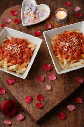 Ingredients label on Gina's Italian Cuisine penne showing non-GMO, vegan-friendly ingredients.