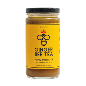 Ginger Bee Tea Concentrate bottle pouring into a cup for a soothing hot drink