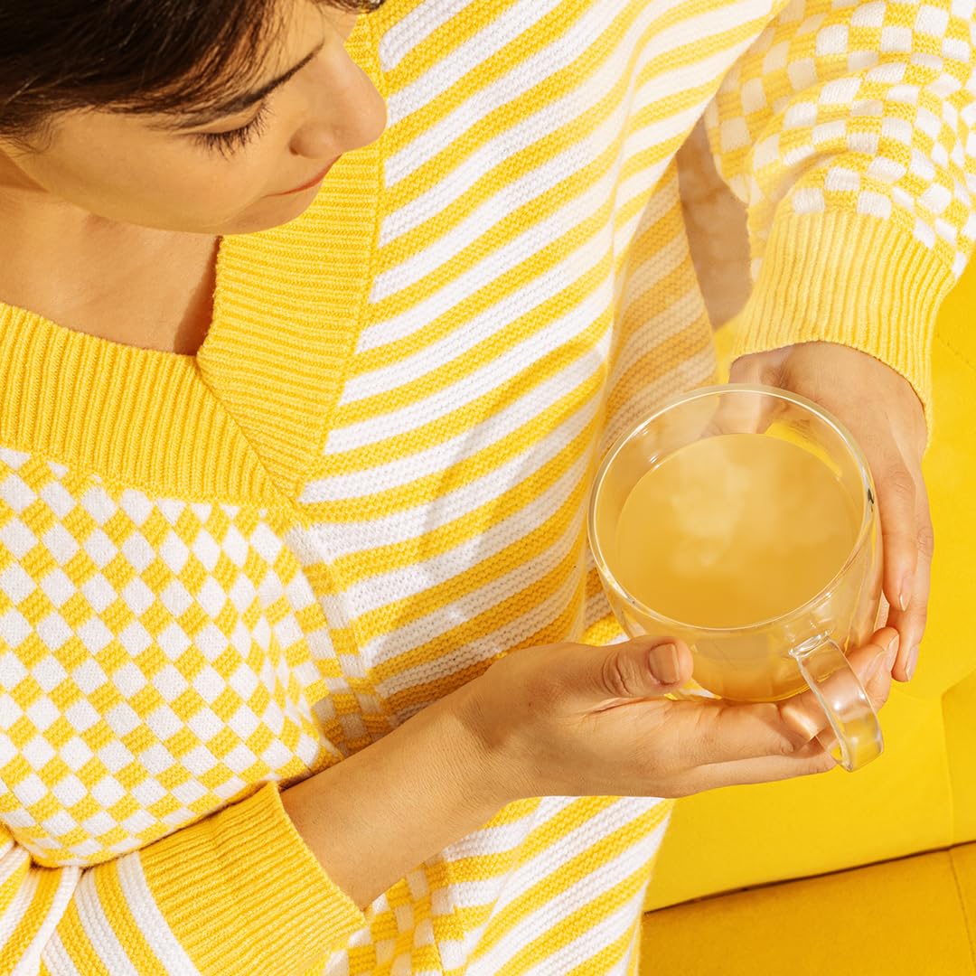 Pour-ready Ginger Bee Tea Concentrate in a glass for a daily ritual