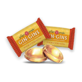 Fresh ginger root beside GIN GINS branding for natural ginger goodness.