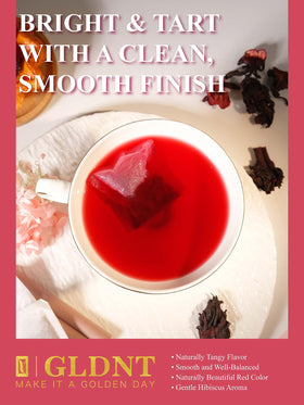 GLDNT hibiscus tea bag brewing in cup, bright ruby hue and tart notes