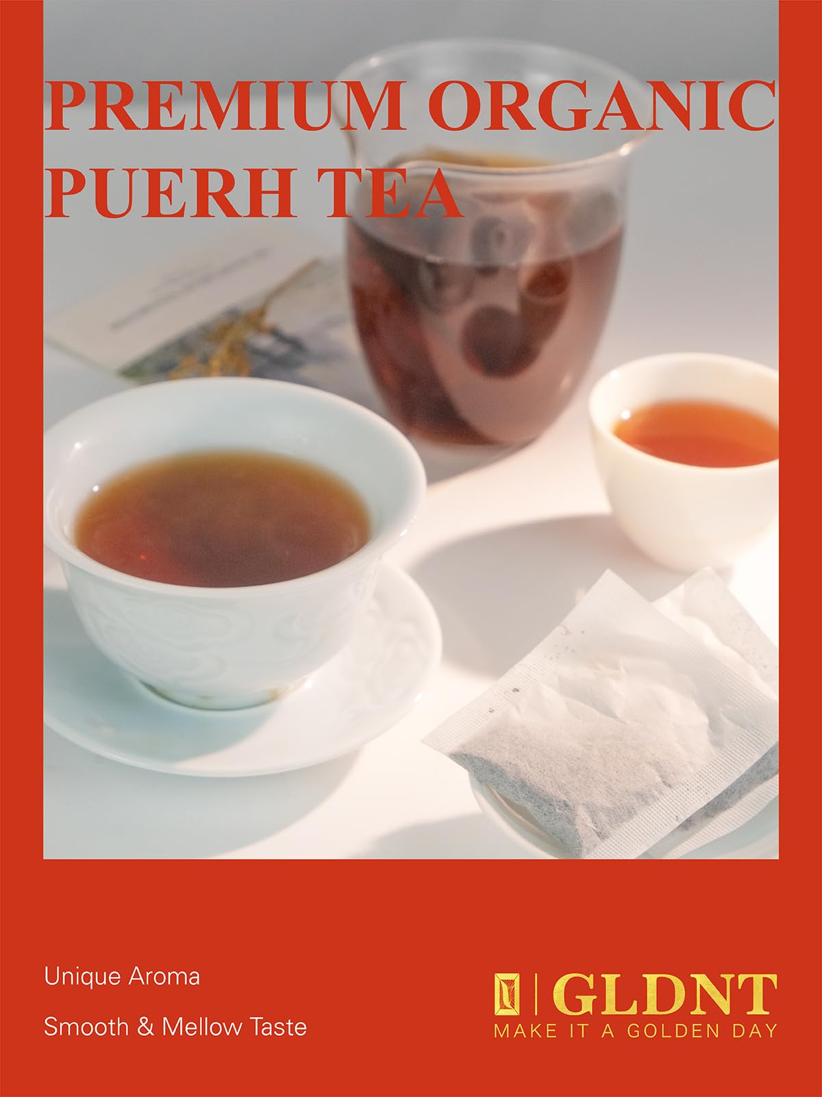 GLDNT Pu-erh steeped tea in a cup with steam reveals bold yet mellow aroma.