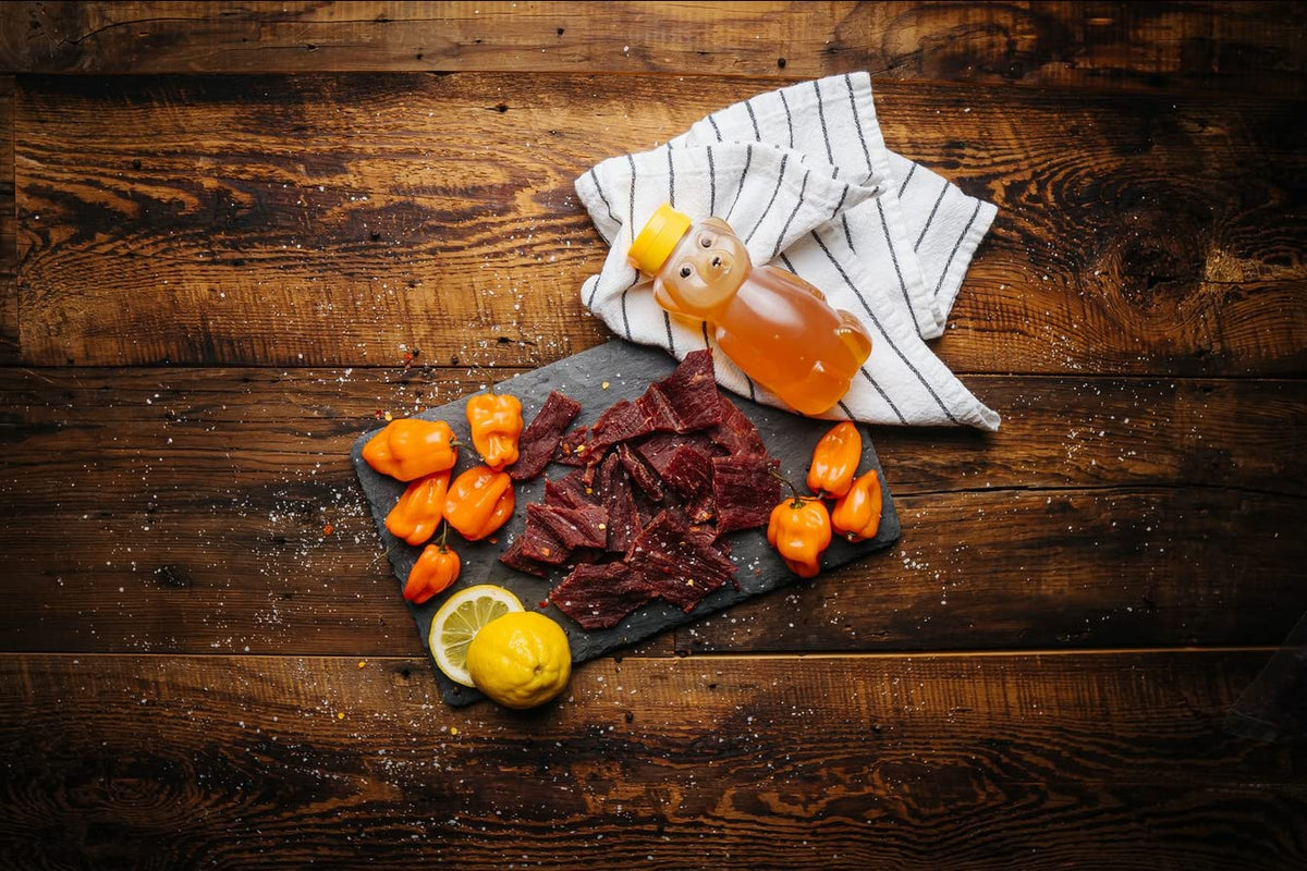 Glenwood Snacks wood-smoked jerky slices arranged for snack-ready appeal.