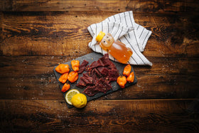 Glenwood Snacks wood-smoked jerky slices arranged for snack-ready appeal.