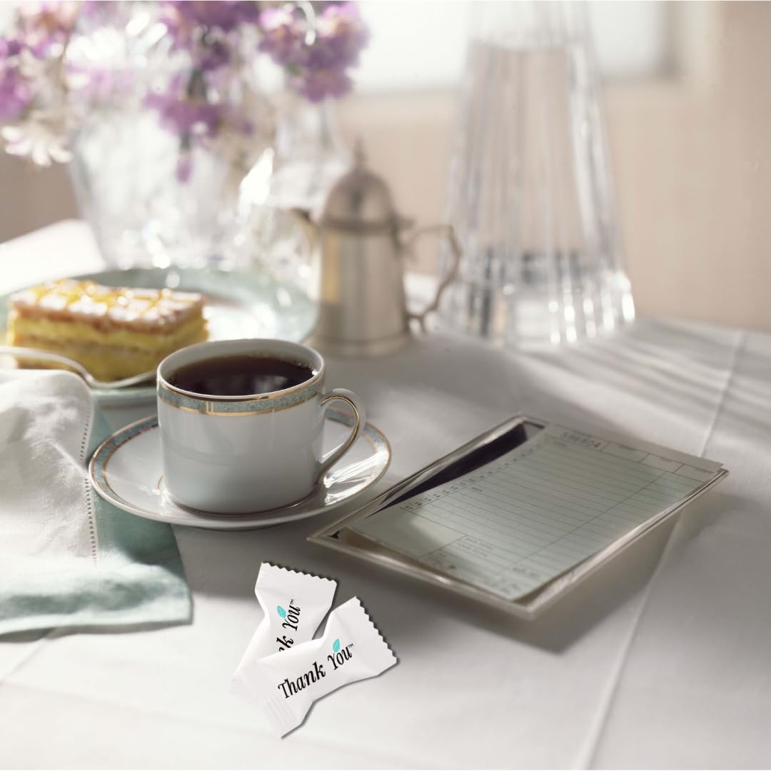 GLOBAL BASICS Buttermints wrapper close-up shows hospitality greeting and premium packaging.