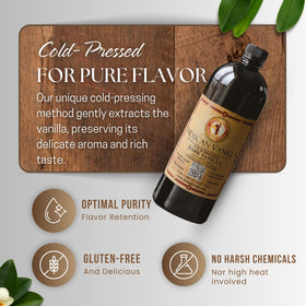 Global Goods vanilla drop over measuring spoon, perfect for precise dessert flavors.