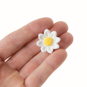 Global Sugar Art white and yellow daisy topper ready to decorate cakes.