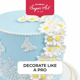 Global Sugar Art white and pink daisies enhance tarts and dessert presentations.