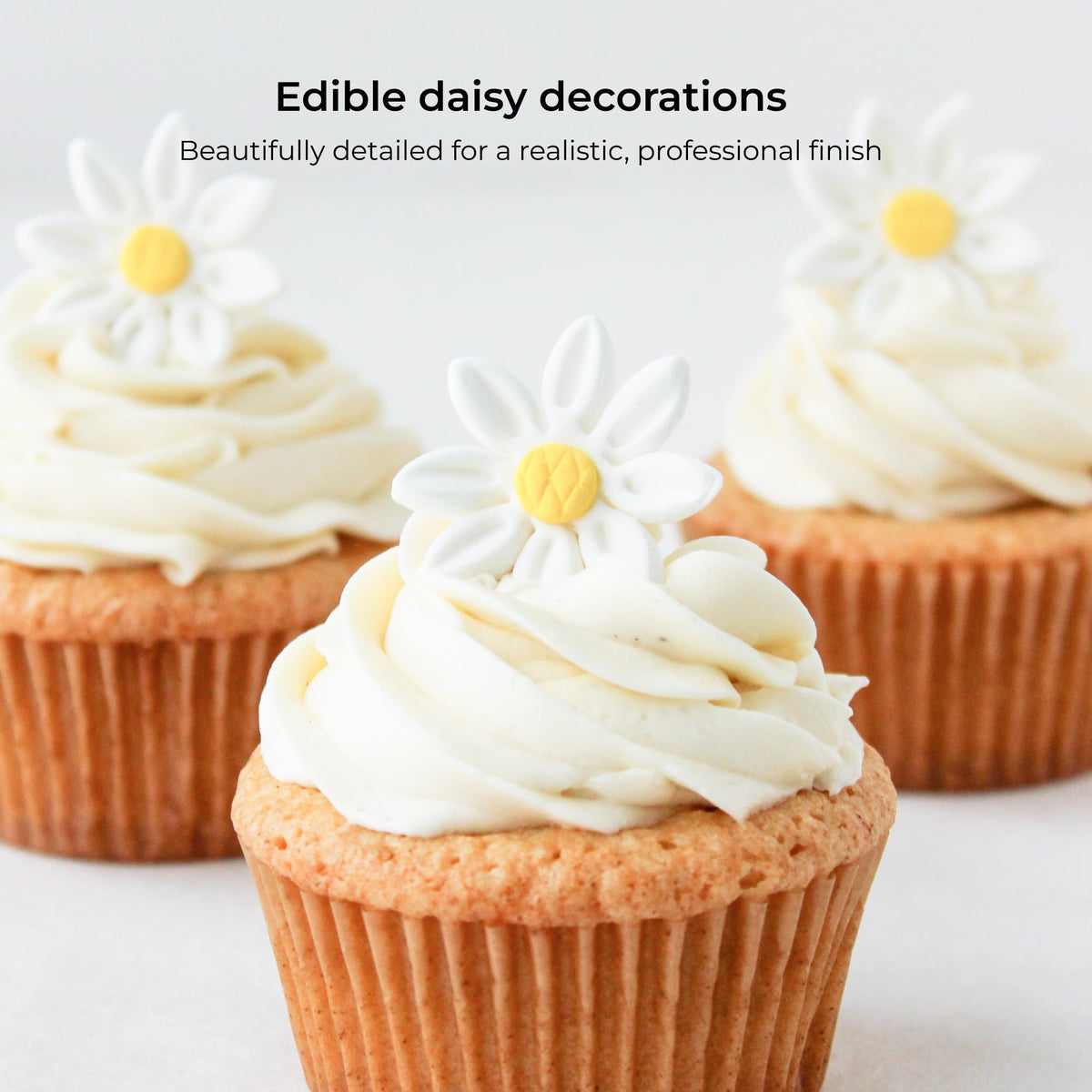 Global Sugar Art edible daisies up close showing handcrafted detail for cupcakes.