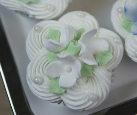 Global Sugar Art Hydrangea blossom sugar flowers for a refined dessert table.