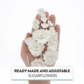 Global Sugar Art Sugar Blossom Cake Spray measures about 9 inches tall by 4 inches wide.