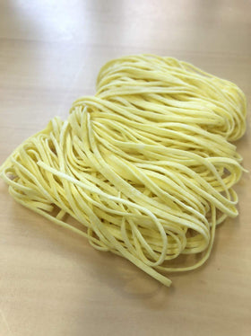 GLUTEN FREE MEISTER ISO 9001 facility badge—quality gluten-free production in Japan.
