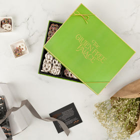 Premium chocolate coating on Gluten Free Palace pretzels in a glossy finish