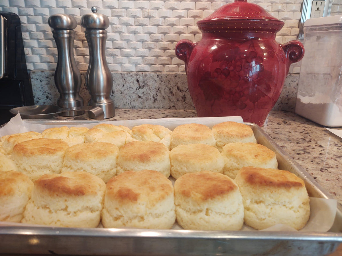 Glutenfreeee plated buttery biscuits for a comforting breakfast.