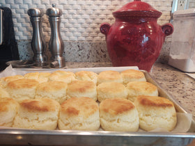 Glutenfreeee plated buttery biscuits for a comforting breakfast.