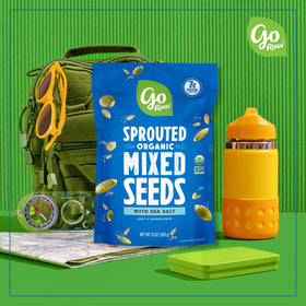 Go Raw organic sprouted sunflower seeds presented as a nutrient-dense crunch for salads.