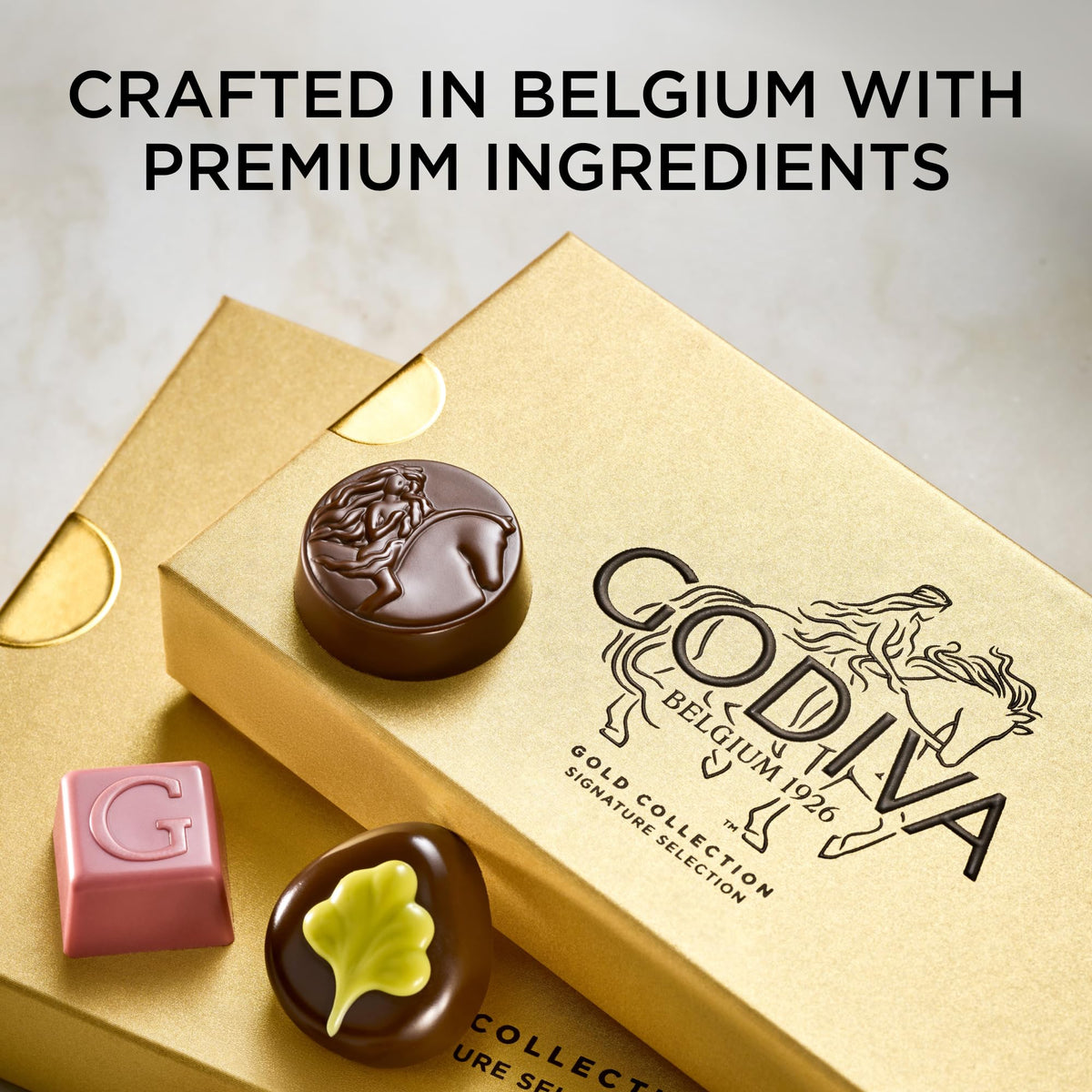 Assorted Godiva chocolates in dark, milk, and white varieties for celebrations