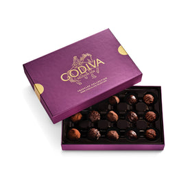 Godiva dark chocolate truffles box close-up; premium ganache centers for gifting.