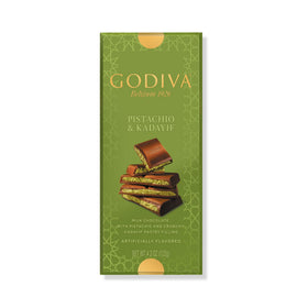 Godiva Dubai Style Milk Chocolate Bar reveals pistachio filling, offering a decadent, luxurious tasting experience.