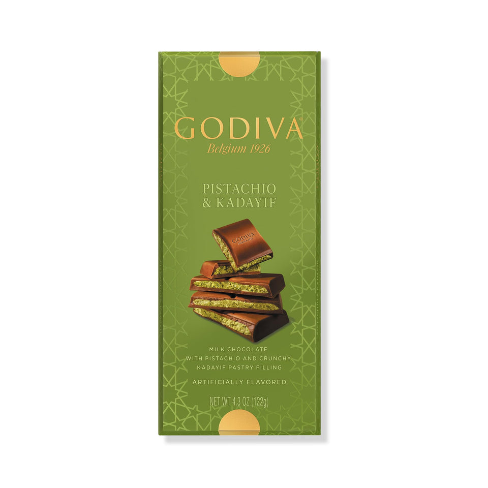 Godiva Dubai Style Milk Chocolate Bar reveals pistachio filling, offering a decadent, luxurious tasting experience.