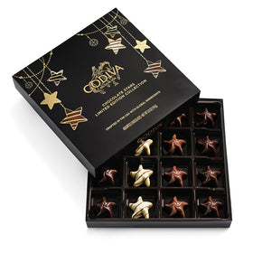Godiva Holiday Stars gift box front with black and gold festive design, ideal for gifting.