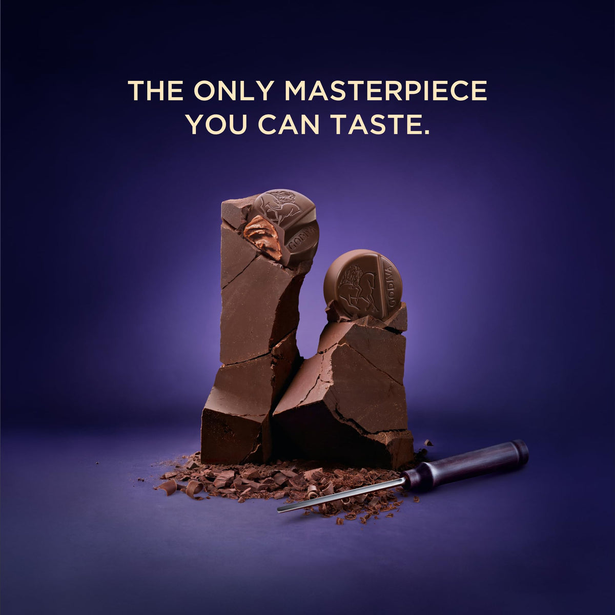 Godiva Masterpiece chocolate shell texture highlights crisp bite.