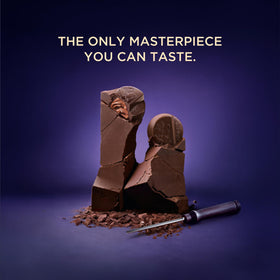 Godiva Masterpiece chocolate shell texture highlights crisp bite.