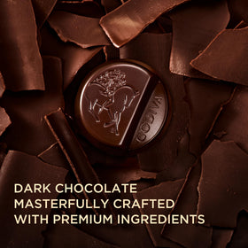 Godiva Masterpiece packaging in black, purple, gold for luxury gifting.