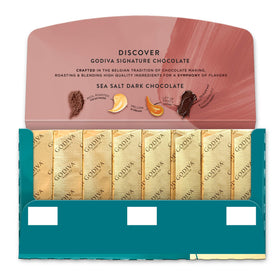 Godiva carton with black-gold design is ready for gifting.