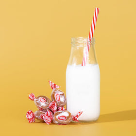 Stacked Goetze's Vanilla Caramel Creams packs with classic packaging