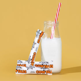 Serving suggestion photo with a candy bowl featuring Goetze's Vanilla Cow Tales Minis.
