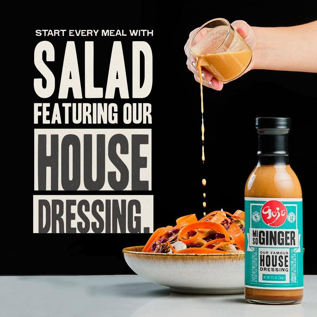 Gojo Miso Ginger Dressing being poured, versatile for salads and bowls.