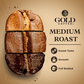 Close-up of Gold Coffee Kanaloa Premium House Blend roast beans.
