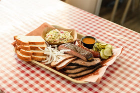 Goldee's Bar-B-Q Sauce glaze brushed on ribs for bold flavor