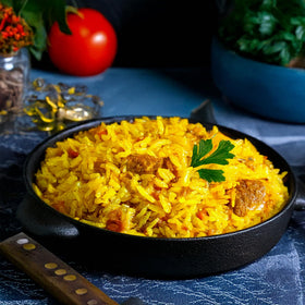 Golden Crown Saffron Yellow Rice grain closeup highlights long-grain quality.