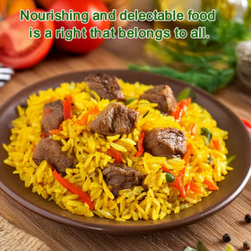 Golden Crown Saffron Yellow Rice spoon serving demonstrates easy serving and texture.