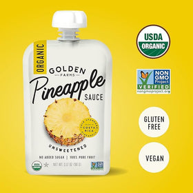 Golden Farms pineapple pouch being squeezed for mess-free portability