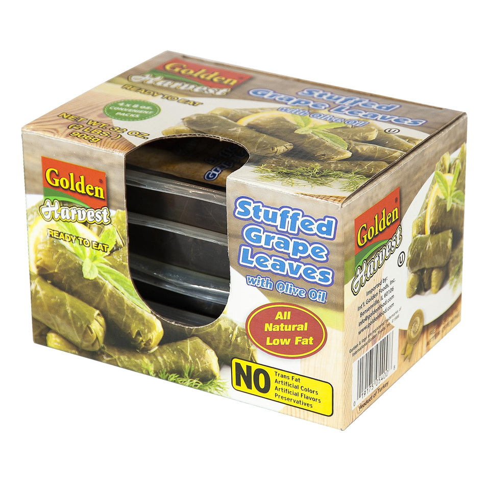 Golden Harvest Dolmas on a plate with olive oil drizzle, gluten-free appetizer option.