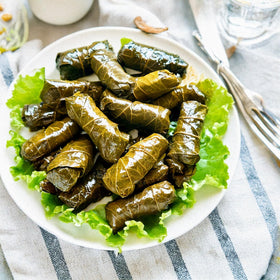 Packaging view showing BPA-free container for Golden Harvest dolmas.