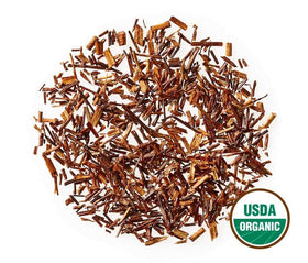 Golden Moon Rooibos packaging flatlay highlights organic quality and eco-conscious packaging