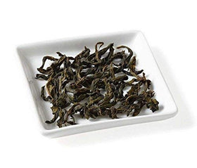 Golden Moon Tea award badge highlighting 2006 and 2008 NA Tea Championship wins.