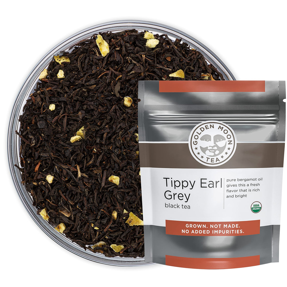 Golden Moon Tea Earl Grey loose leaf in a cup with fragrant aroma.