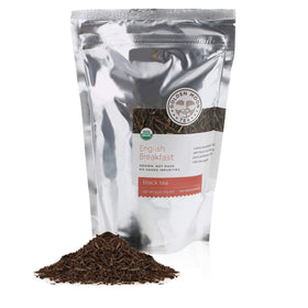 Golden Moon Tea four-blend leaves show layered notes of malt, floral, and smoke.